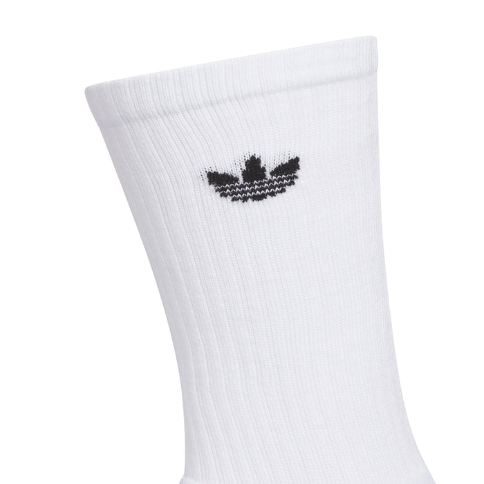 White crew sock with black trefoil-style logo on the cuff, ribbed knit