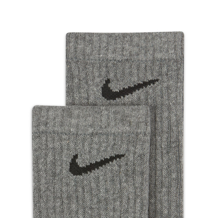 Cushioned crew sock fabric close-up with black Nike swoosh
