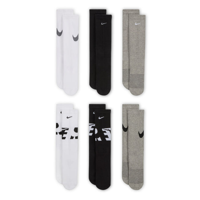 6-pack youth crew socks in white, black, and gray with swoosh logos on cuffs