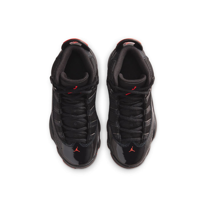 Kids black sneakers, lace-up with red Jumpman on tongue, front view