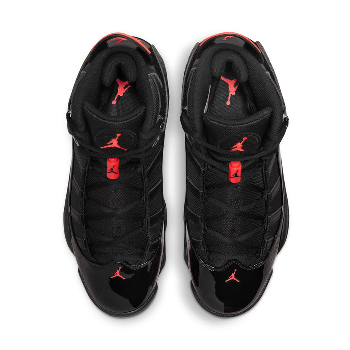 Men's black high-top sneakers with red Jumpman logo on the tongue