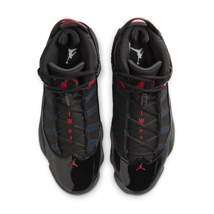 Pair of men's high-top sneakers with black interior lining and red logo accents