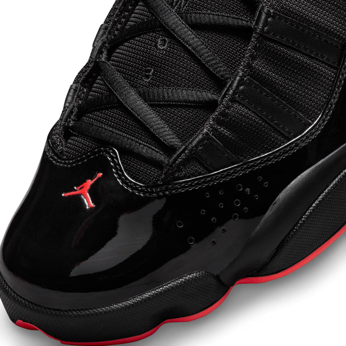 Men's black high-top sneaker with red Jumpman and textured toe panel