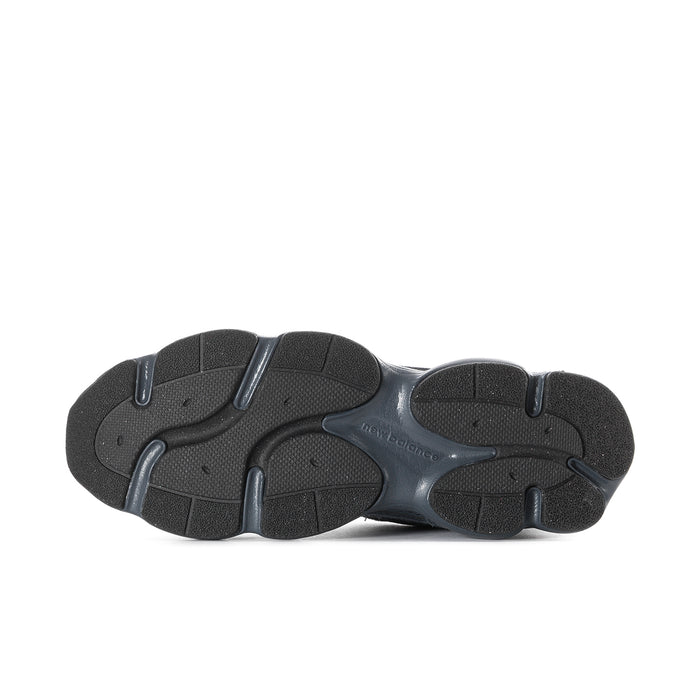 Men's New Balance sneaker outsole, textured dark tread with molded support