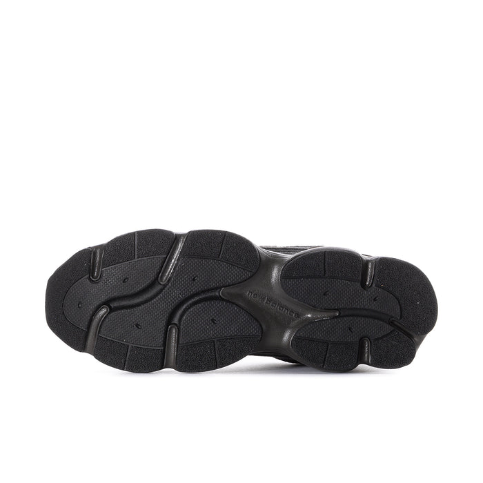 Men's New Balance 603 outsole view, black rubber tread for traction