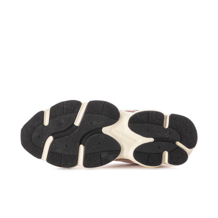 Women’s sneaker outsole view with black tread and light midsole