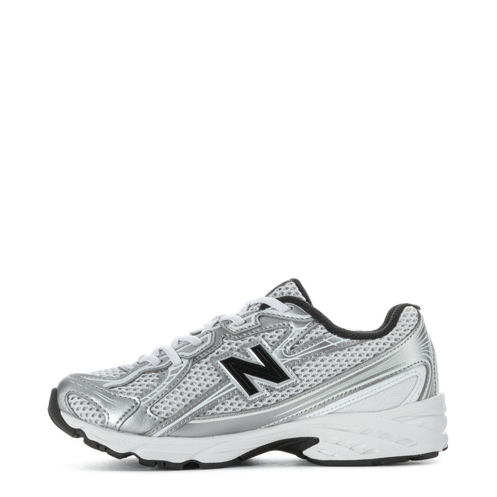 Kids silver metallic running sneakers, side view with black New Balance N and laces