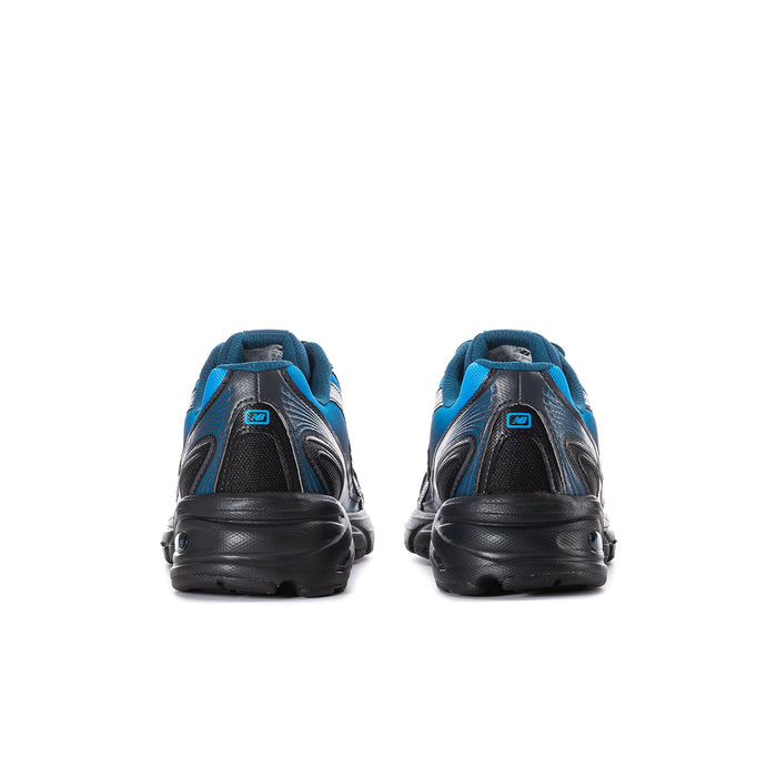 Men's New Balance sneakers from heel view, blue uppers with black heel and sole.