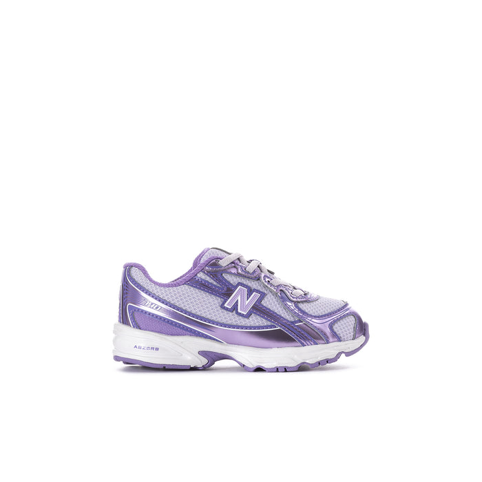 Toddler New Balance sneakers in lilac and violet with white laces and cushioned sole