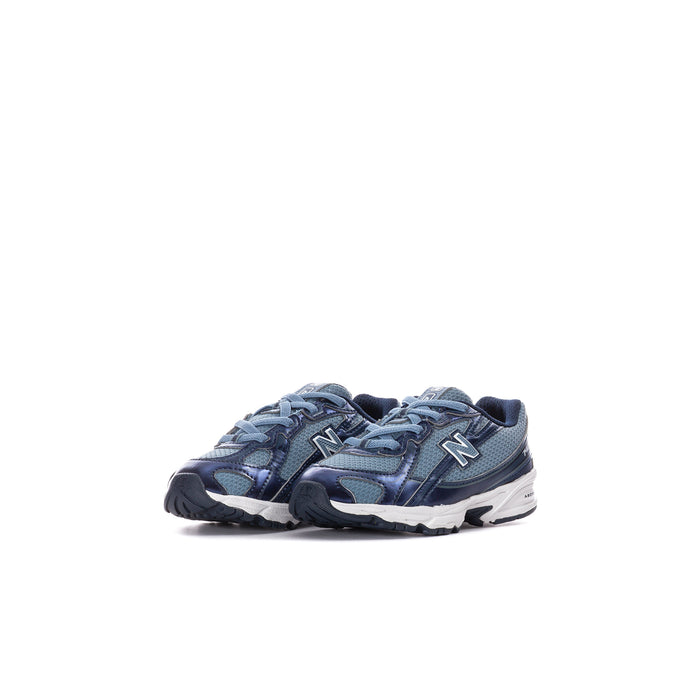 Toddler sneaker pair, blue and navy with white midsole, lace-up front