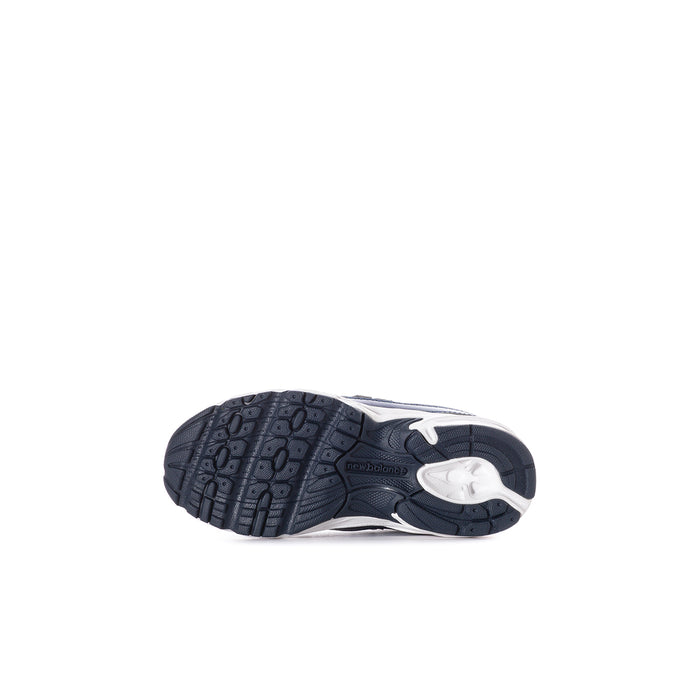 Toddler sneaker outsole tread view, dark blue and white rubber sole