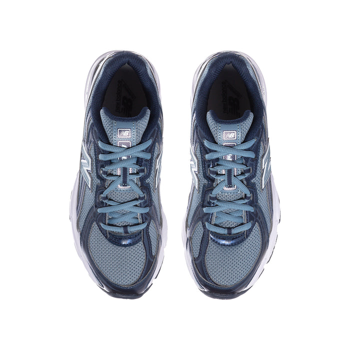 Youth running shoe pair, lace-up front with shadow blue mesh and navy trim