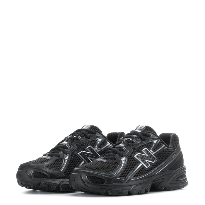 Youth black lace-up sneakers with twin silver N logos and mesh quarter panels