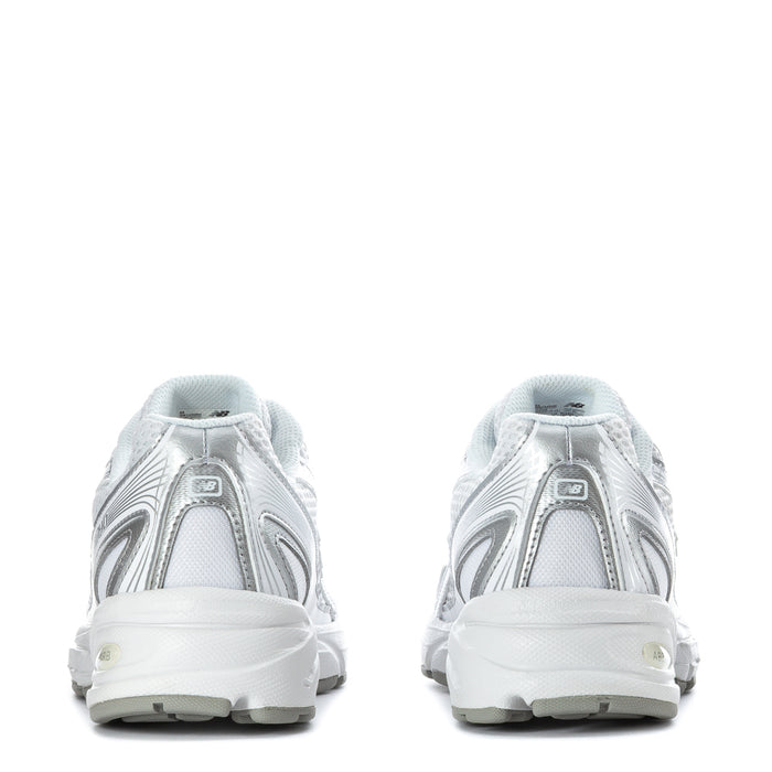 Youth 740 sneakers back view in white and silver metallic, cushioned heel collar