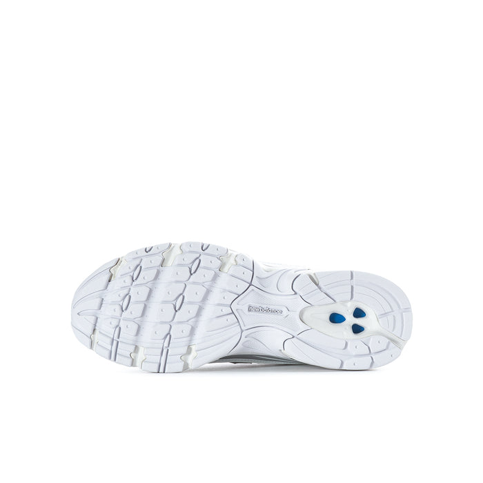Youth silver metallic sneakers outsole with traction tread and blue logo patch