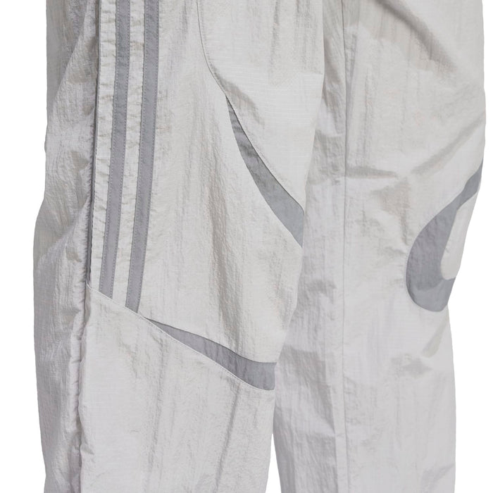 Men's woven track pants fabric detail, grey side stripe and contrast panel