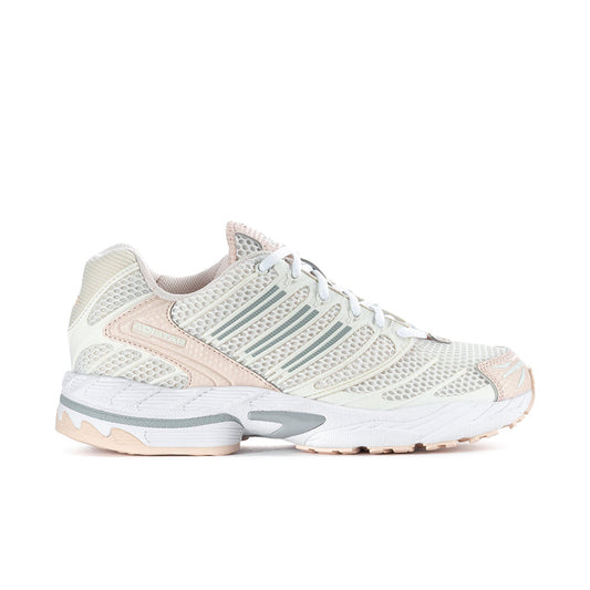 Women’s running shoes in chalk white with mint and peach detail, lace-up style