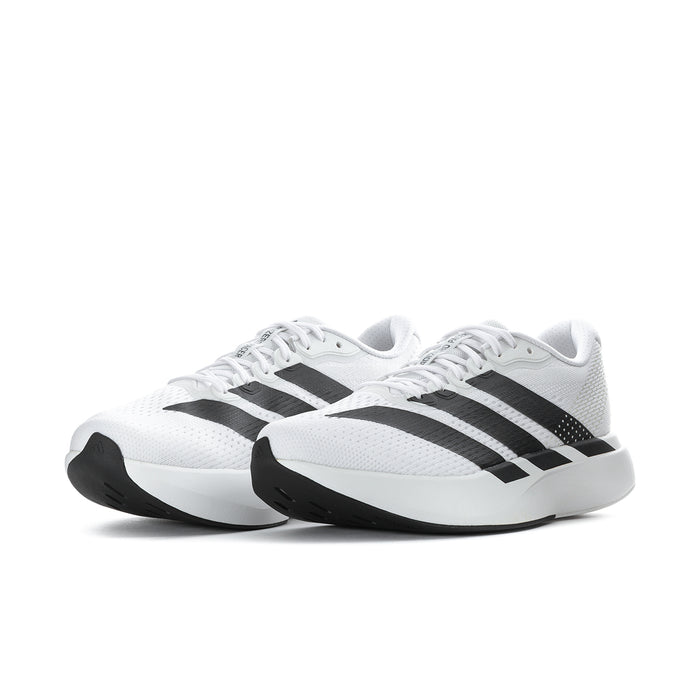 Men's white and black striped running shoes, side angle view, lace-up