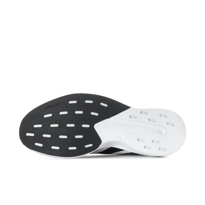 Men's white running shoe outsole view with dark traction pods