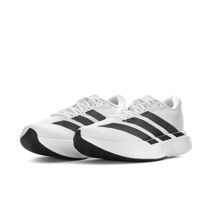 Women’s running shoes with white uppers, black stripes, and cushioned white sole