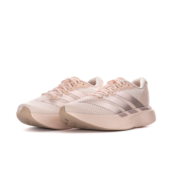 Women’s running shoes, light pink knit upper with metallic gray side stripes and laces.