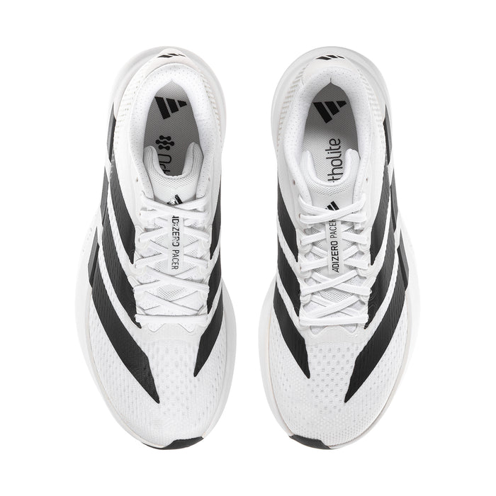 Pair of women’s running shoes, white with black stripes and lace-up front