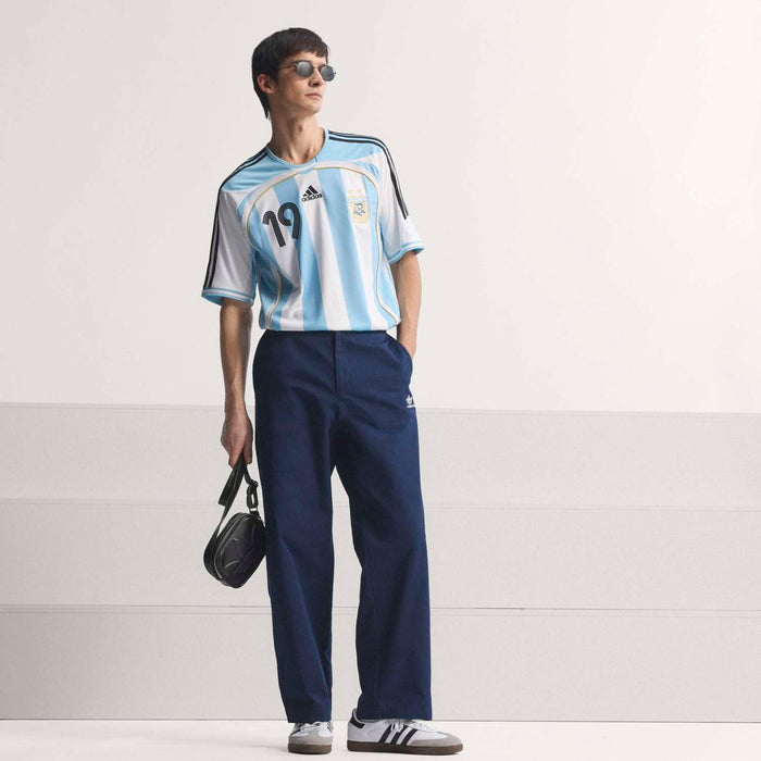 Men's AFA home jersey with light blue and white stripes and adidas logo, short sleeves