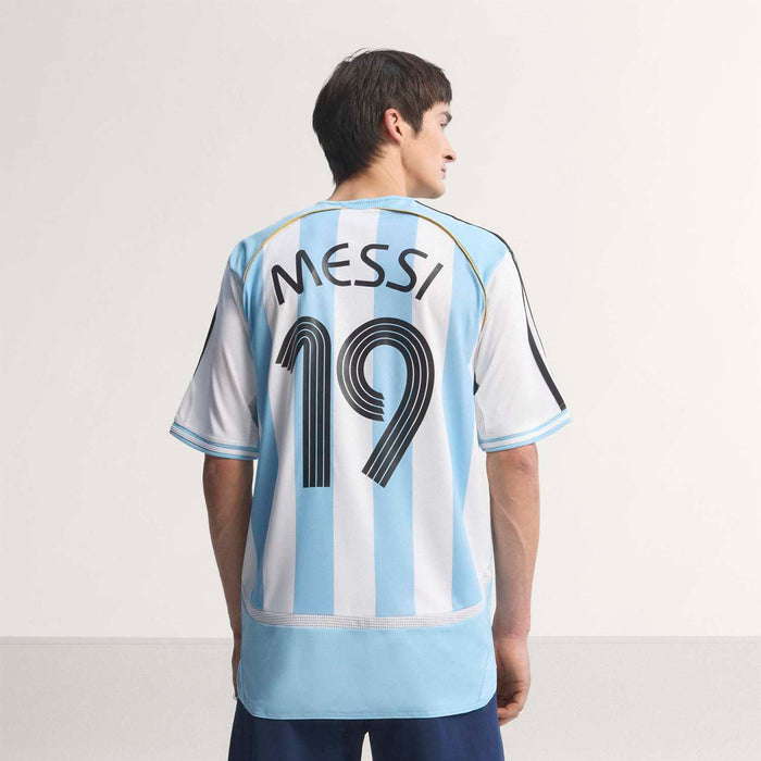 Men's AFA home jersey back with MESSI 19 print and light blue striped design