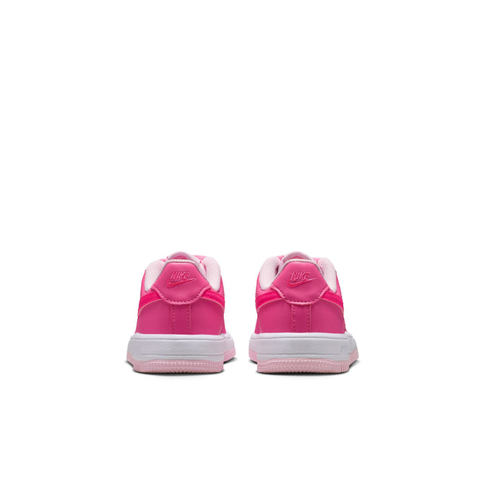 Kids pink Nike sneakers rear view with heel tab and white midsole