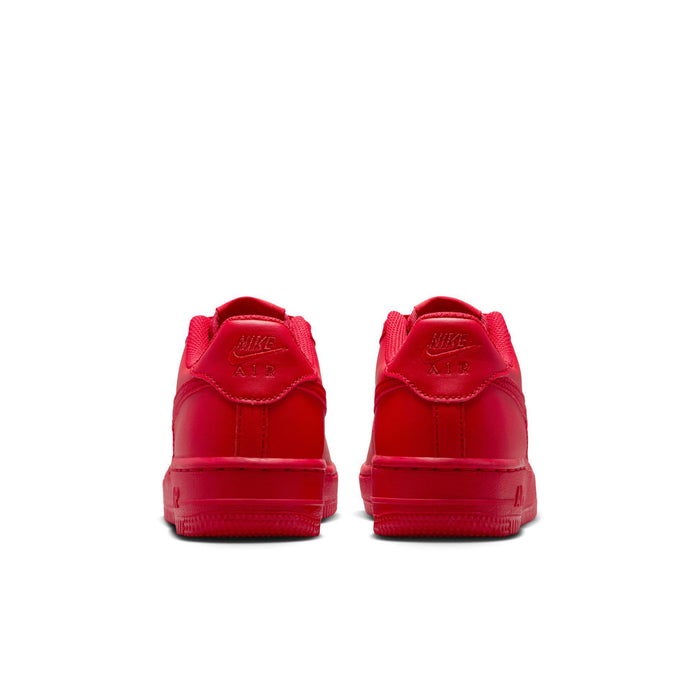 Red youth sneakers from the back with heel tabs and Air branding