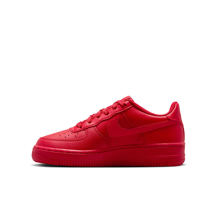 Red youth low-top lace-up sneaker side view with Nike swoosh