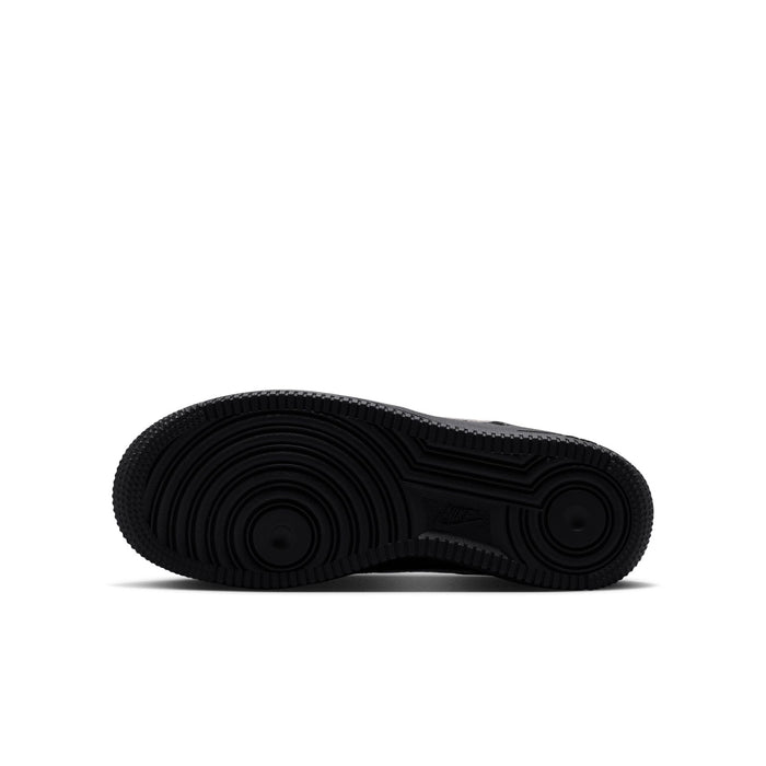 Black sneaker outsole with textured tread pattern