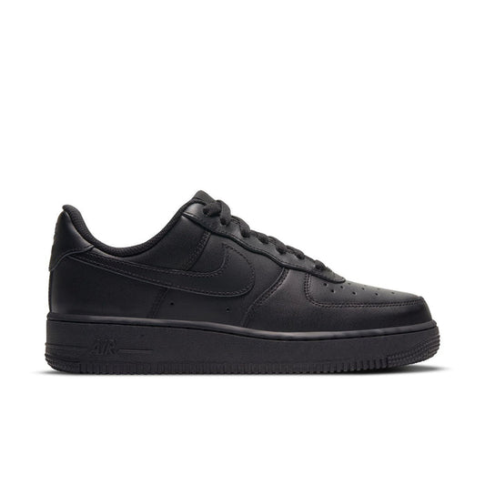 Black women’s low-top sneakers with leather-look uppers and lace-up front