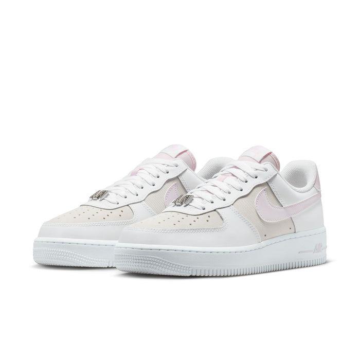 Women's Air Force 1 sneakers, white upper with lilac swoosh, side by side
