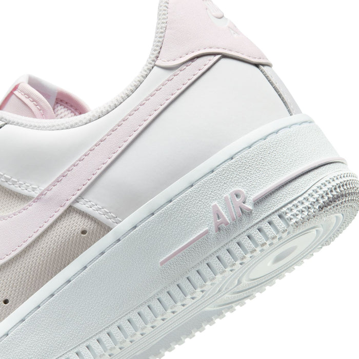 Women's Air Force 1 midsole close-up, white foam with lilac 'AIR' detail
