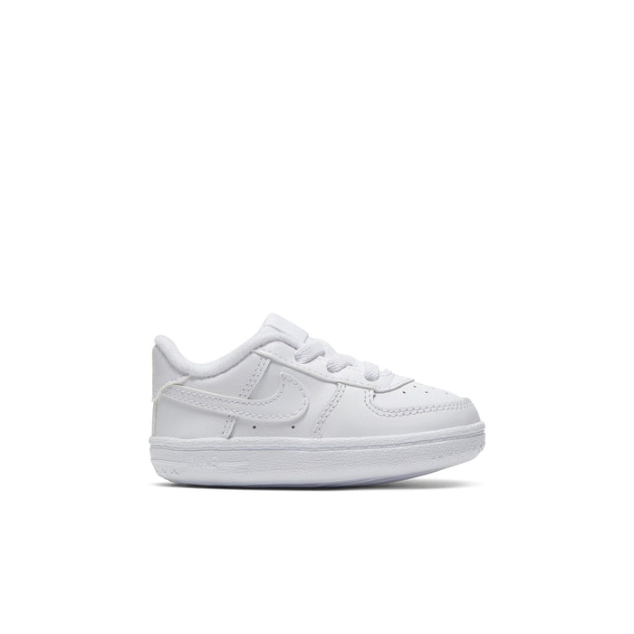 Infant white low-top sneakers with hook-and-loop straps and swoosh logo