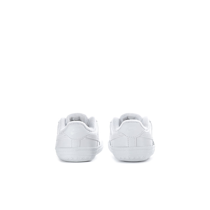 Infant white low-top sneakers, heel view, cushioned back and logo stitching