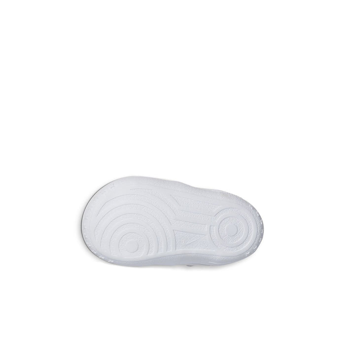 Infant white low-top sneaker outsole, textured grip pattern