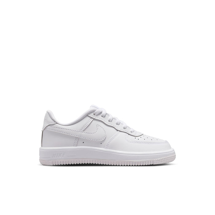 Kids' white low-top sneakers with Nike swoosh and lace-up design