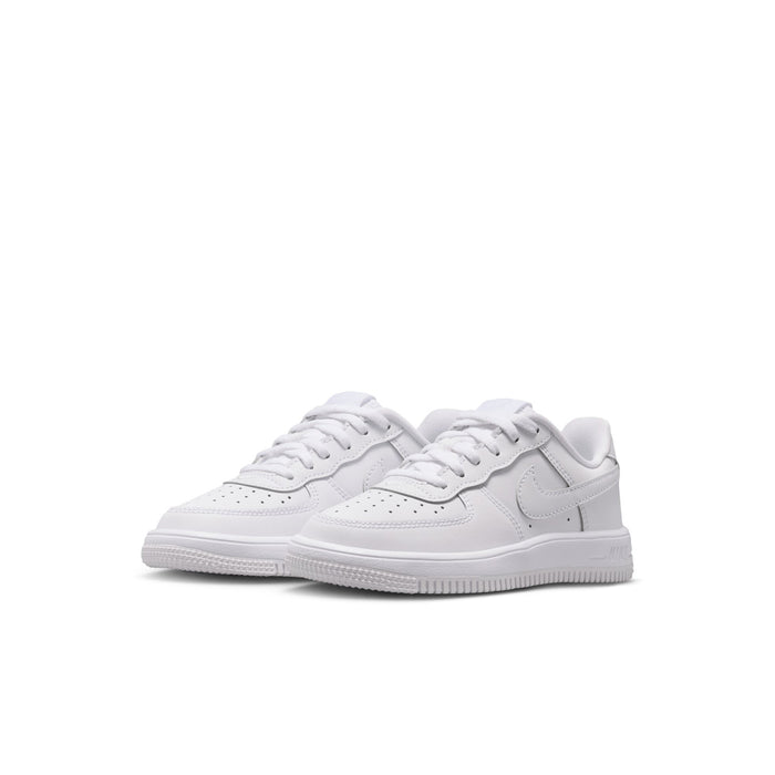Kids' white low-top sneakers, angled view with lace-up and side swoosh