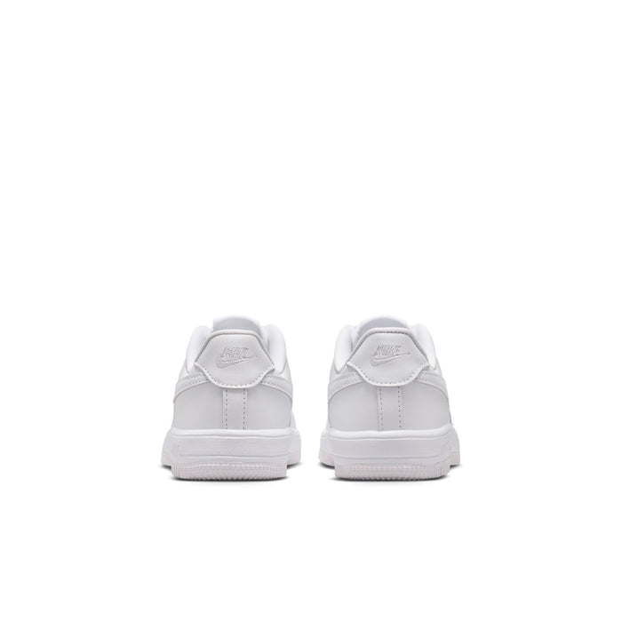 Kids' white low-top sneakers with rear tabs and cushioned heel