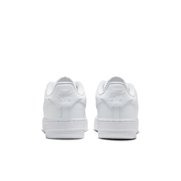 Youth low-top sneakers heel view, white with Nike logo and cushioned back