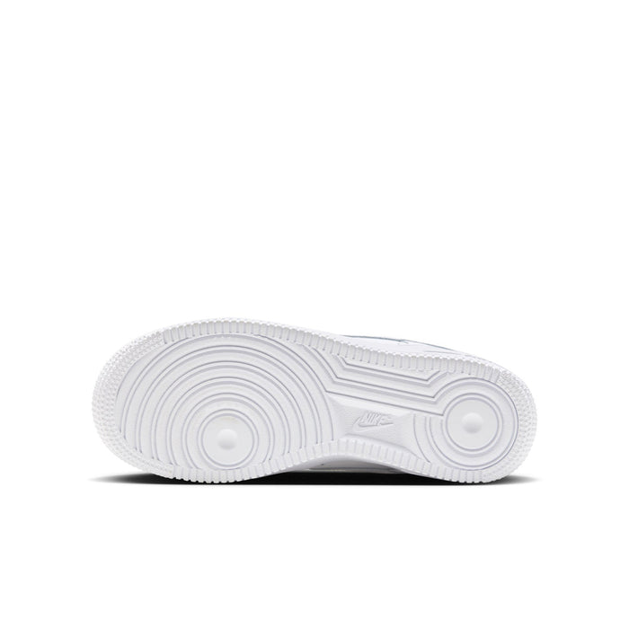 Youth low-top sneaker outsole, white rubber traction with circular pivot point