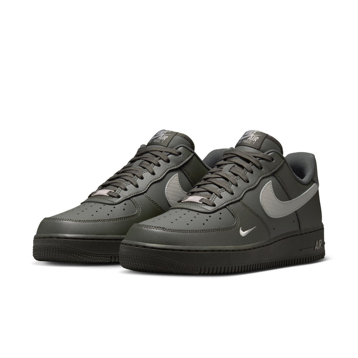 Men's Air Force 1 low-top sneakers in dark olive, lace-up style with silver Swoosh