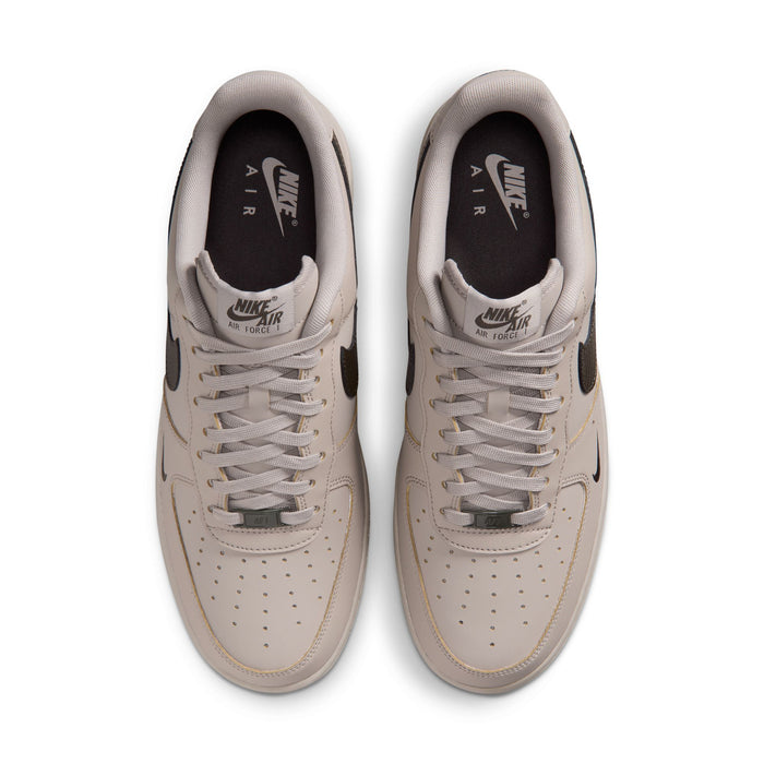 Men's low-top sneakers, top view of the pair, light beige uppers and lace-up closure