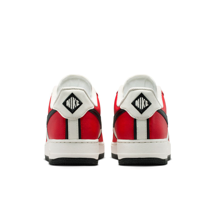 Men's low-top sneakers heels with Nike branding, red side panels, and black heel stripe