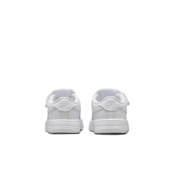 Toddler white low-top sneakers, back view with heel tabs and cushioned collars