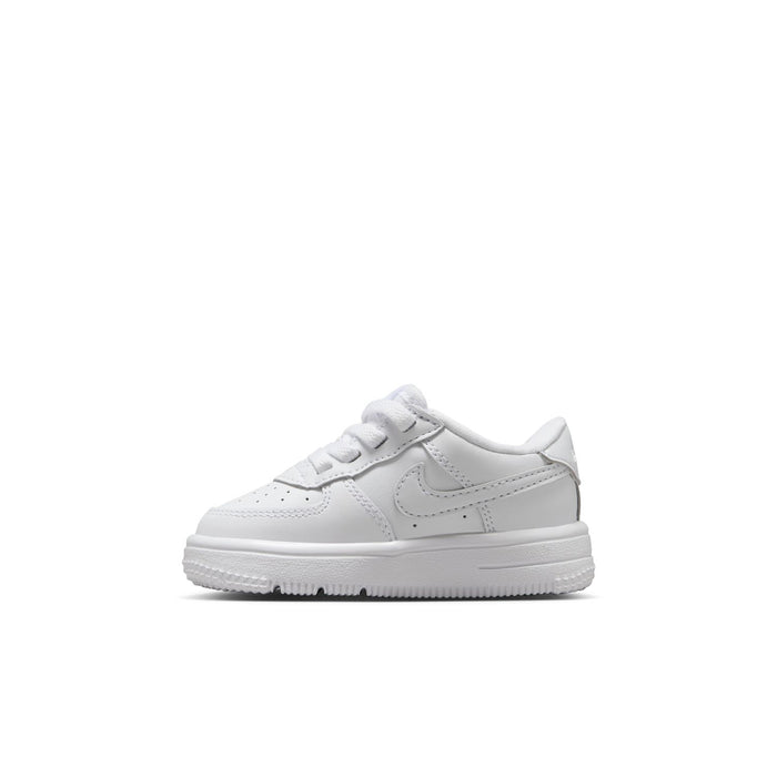 Toddler low-top sneakers in white with swoosh logo and padded ankle collar