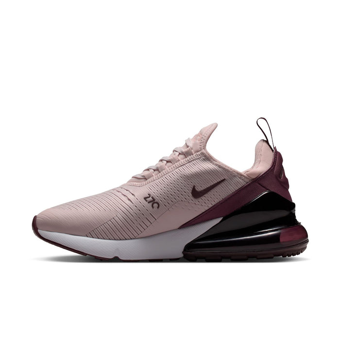 Women's lace-up running shoe with dusty pink upper, burgundy side detailing, and black air sole