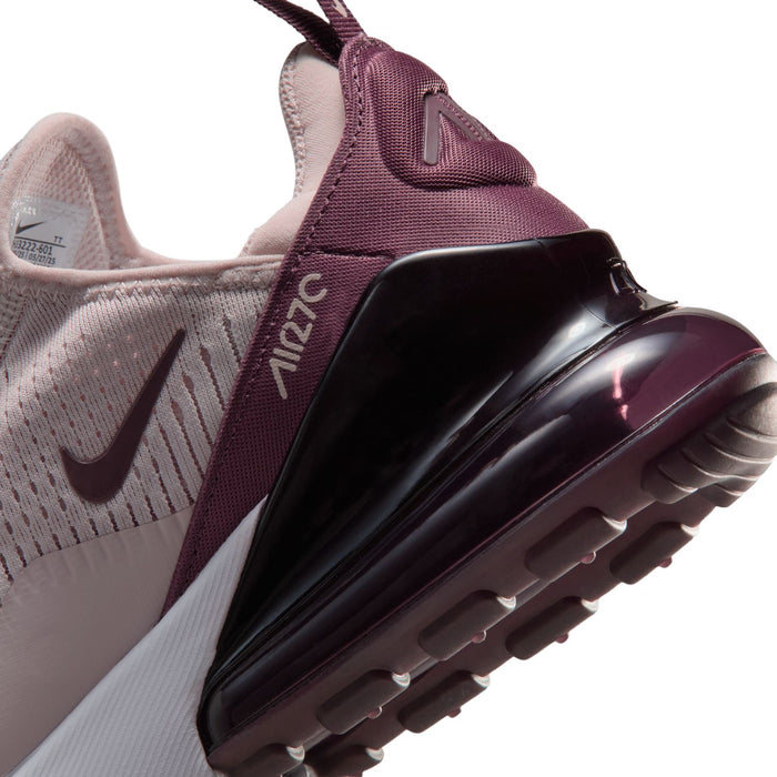 Close-up of dusty pink shoe collar and black glossy air unit with ridged outsole tread
